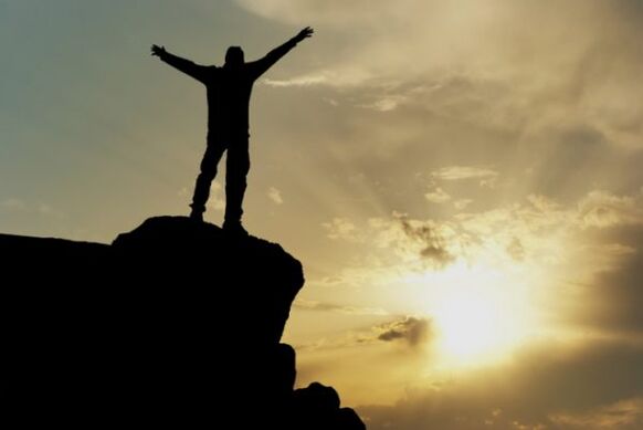 Man on top of the mountain